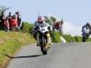 Adrian Archibald in front of the late Andrew Neil skerries 100