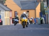 Dean Harrison leads David Yeomans and Alan Bonner through the narrow streets of Dunmanway at the 2010 Munster 100