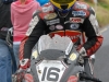 Sitting behind Superbikes when there are lose chippings isnt good for the health of a bike Athea 2011